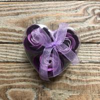 3 boutons de rose violet